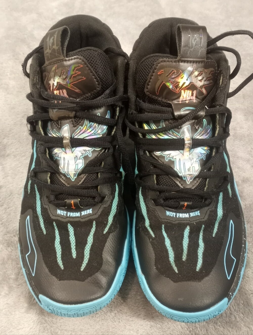 Puma M.E.L.O. 111 "01 black sneakers with blue claw-like graphics Size 8.5
